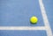 Tennis ball indoor on tennis court, white line