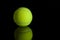 Tennis ball with reflection