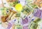 Tennis balls, trophy and money. Euro banknotes. Prizes, awards, investment concept. Business tennis background. Close up