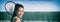 Tennis club happy Asian girl with racket smiling for lesson at indoor hard court panoramic banner. Sports athlete woman