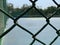 A tennis court looking over the net