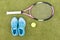 Tennis equipment set of tennis racket, ball and female sneakers