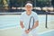 Tennis, fitness and portrait of sports Asian man with training, exercise and workout in outdoor tennis court. Mindset