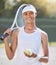 Tennis, fitness and sport woman with racket for training, exercise and workout on tennis court. Portrait, smile and