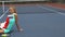 Tennis girl having a rest on court