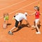 Tennis instructor working with girl