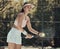 Tennis player girl, racket tennis ball and focus before serve in contest, game or training outdoor in summer. Woman