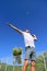 Tennis player serving playing outdoors - sport man