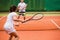 Tennis players playing a match on the court