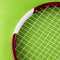 Tennis racket over synthetic surface