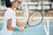 Tennis, racket and serve with woman athlete training on game court for fitness, workout and health. Motivation