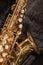 Tenor sax golden saxophone macro with selective focus on black
