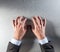 Tensed businessman hands expressing impatience, stress or self-controlled anger