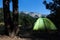 Tent against mountain at night