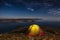 Tent against mountain at night