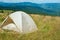 Tent on an alpine meadow