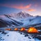 Tent camp and orange tents on the plateau of a mountain the point of acclimatization of climbers before a