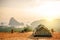 Tent Camping on the high mountains with blue sky in morning at samet nangshe, Phang Nga province,Thailand