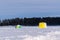 Tent on ice fishing of winter. Landscape winter. Ice fishing is popular sports for Canada