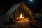 tent with lantern and campfire burning inside, for a warm and welcoming shelter