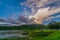 Tent spots along the reservoir in the middle of the fores