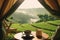 Tent view, where a delightful tea setup awaits amidst a breathtaking backdrop of nature\\\'s serene landscape. Ai generated