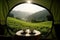 Tent view, where a delightful tea setup awaits amidst a breathtaking backdrop of nature\\\'s serene landscape. Ai generated