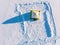 Tent for winter ice fishing, top aerial view, fisherman holding rod in hole lake