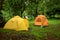 Tents on campground with laundry hanging up to dry on line