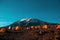 Tents in a camping site on Kilimanjaro mountain under the starry night sky