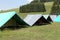 Tents of a campsite of the boy scouts in the mountains in summer