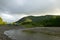 Tents and campsite on wild Alaskan river bank