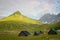 Tents erected on the trekking route to Gangabal Lake in Kashmir. Morning light hitting the mountain