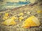 Tents in Everest Base Camp in cloudy day, Nepal, vintage retro.