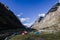 .tents in Llamacorral camp with snowy mountains in the background in the trekking of the quebrada santa cruz