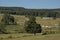 Tents of a scouts camp in a meadow in the hills of Ardennes, Belgium