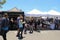 Tents set up with food vendors and people sampling their wares, San Diego, California, 2016.