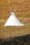 Tepee tent in the outdoors, in autumn.