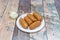 tequeÃ±o is a fried breaded cheese stick or spear of bread dough