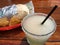 Tequila drink served with Burrito and Nachos