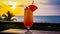 Tequilla Sunrise cocktail on background with blue sea and sunrise sky tropical background. Generative AI