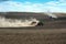 Terebovla region, Ternopil ,Ukraine - 14 September, 2019 : Tractor works in field, creates beautiful dust plumes