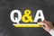 Term Q and A, questions and answers, written on chalkboard