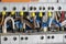 Terminals, contacts, circuit breakers wiring in electrical switchboard providing a safe supply of electricity