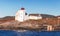 Terningen Lighthouse. White navigation tower, Norway