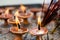 Terra-cota oil lamps as religious offerings at temple in Nepal.