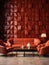 Terra cotta leather sofa and dark red armchairs near 3d panel wall. Interior design of modern living room