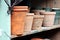 Terra Cotta Pots on Shelf