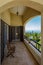 Terrace balcony with chairs in tropical luxury apartment.