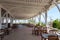 Terrace with breakfast tables near the beach in hotel Solymar Soma Beach, Hurhgada, Egypt